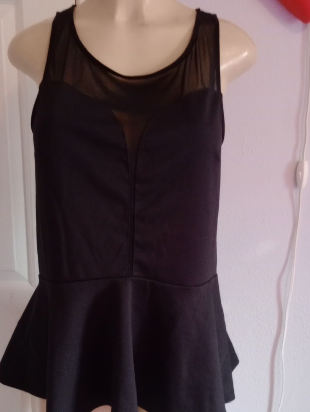 Sleeveless Black Peplum Blouse with Sheer Mesh Yoke